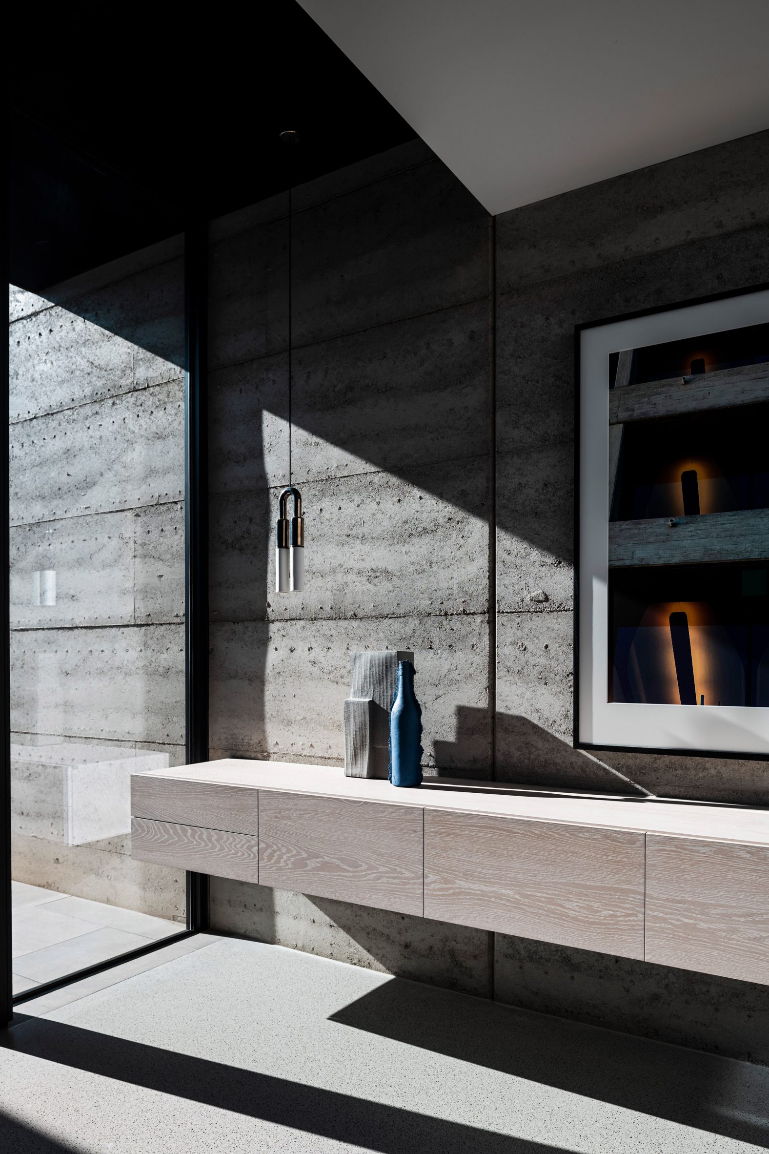 Rammed earth wall at Casa di Campo in Melbourne