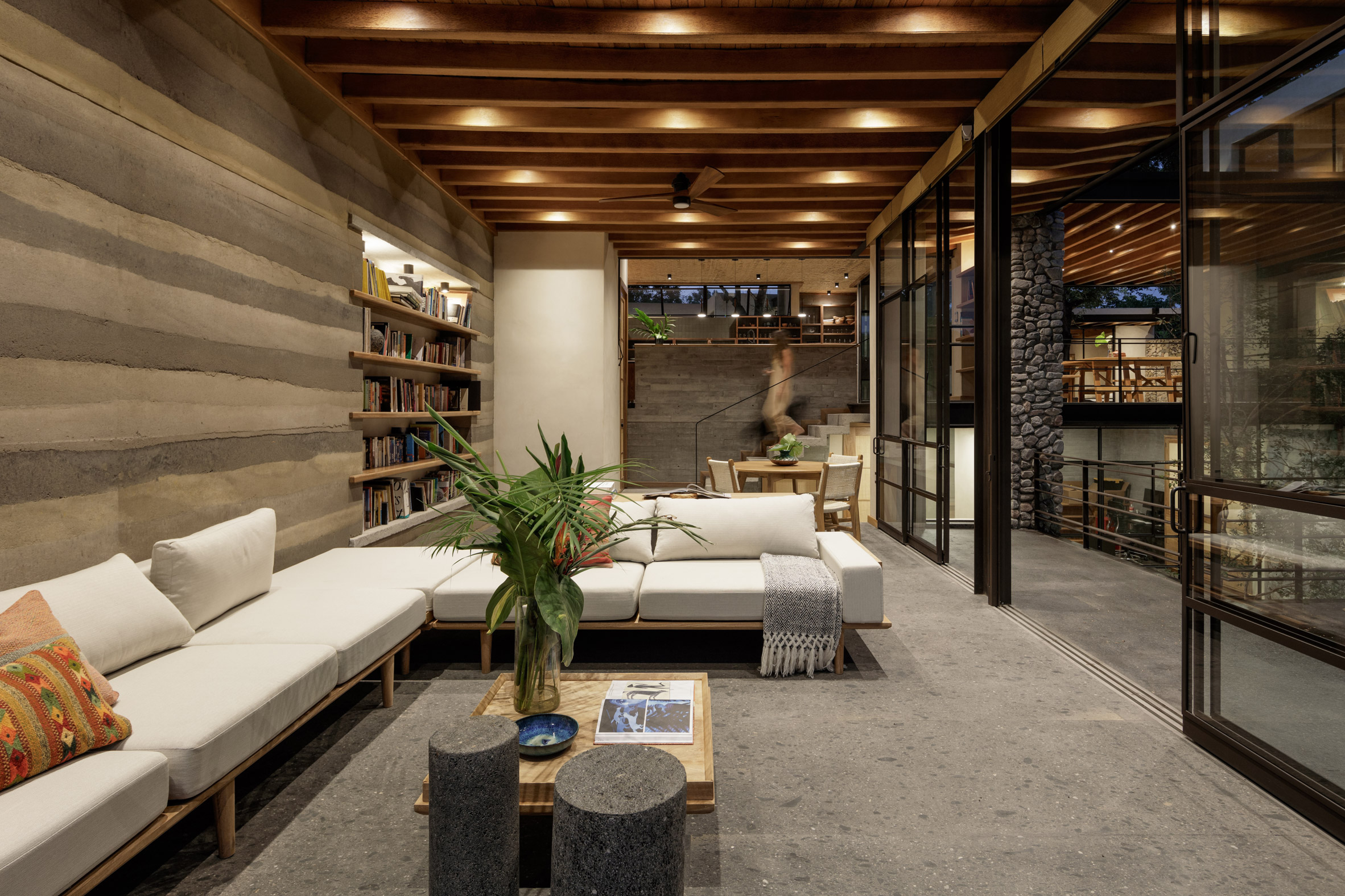 Living room with rammed earth wall