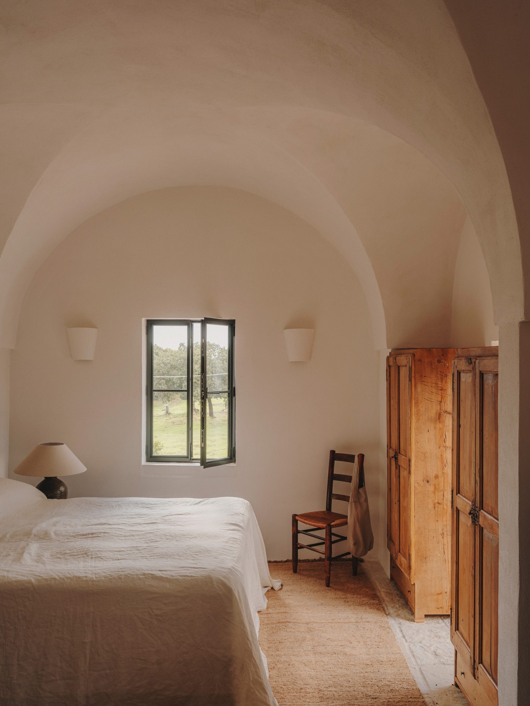 minimalist bedroom of Casolare Scarani in Puglia by Studio Andrew Trotter