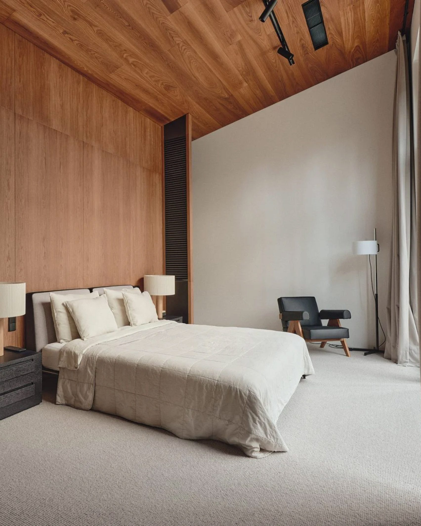 Minimalist wooden bedroom in holiday home by Hanna Karits