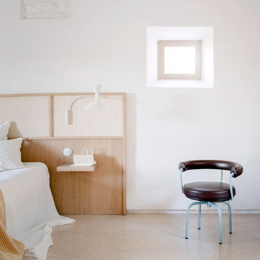 Minimalist bedroom with wooden details