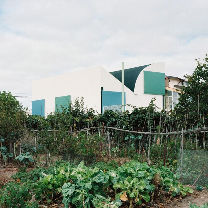 A House with an Inverted Roof by Fala Atelier