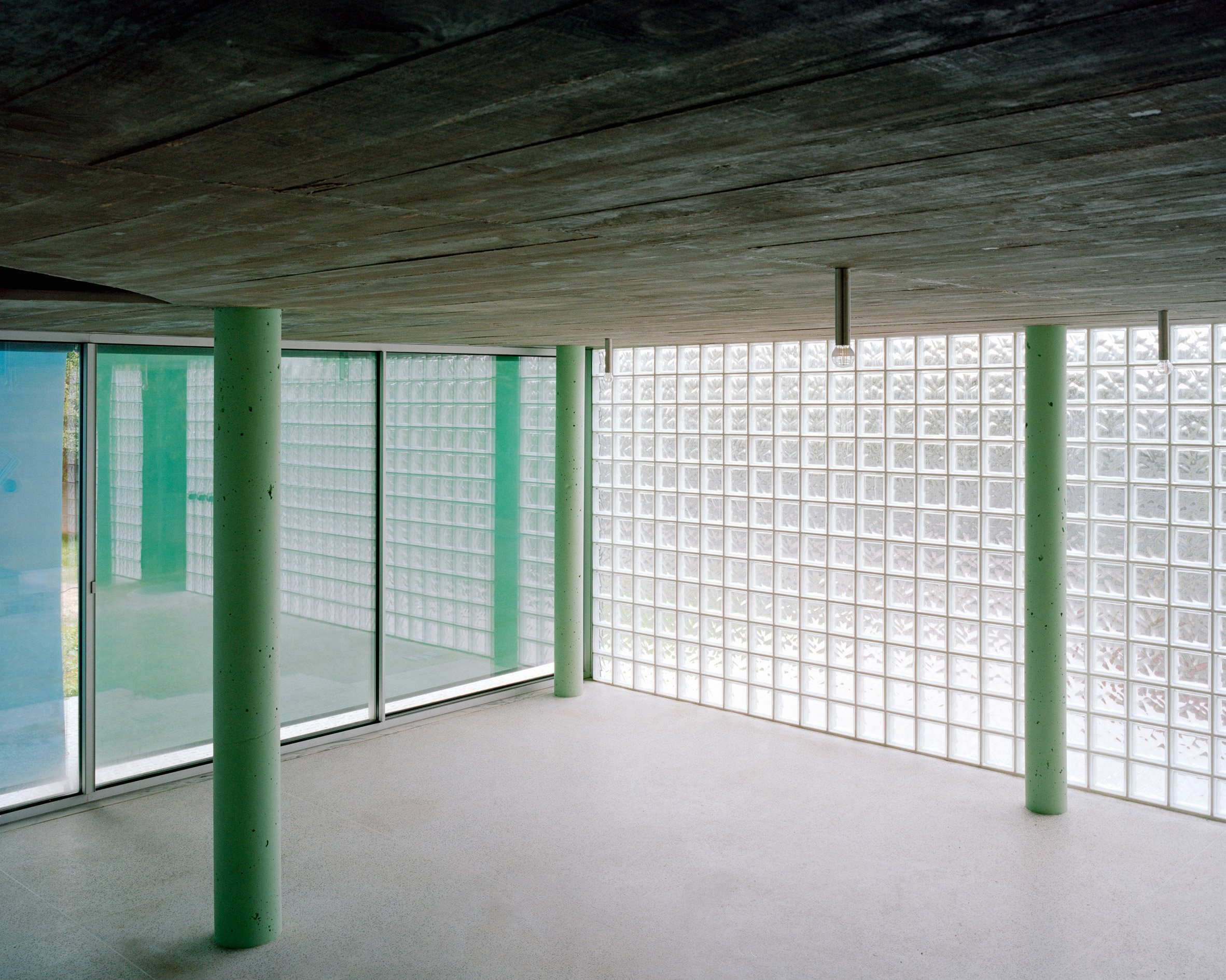 Interior view of A House with an Inverted Roof by Fala Atelier